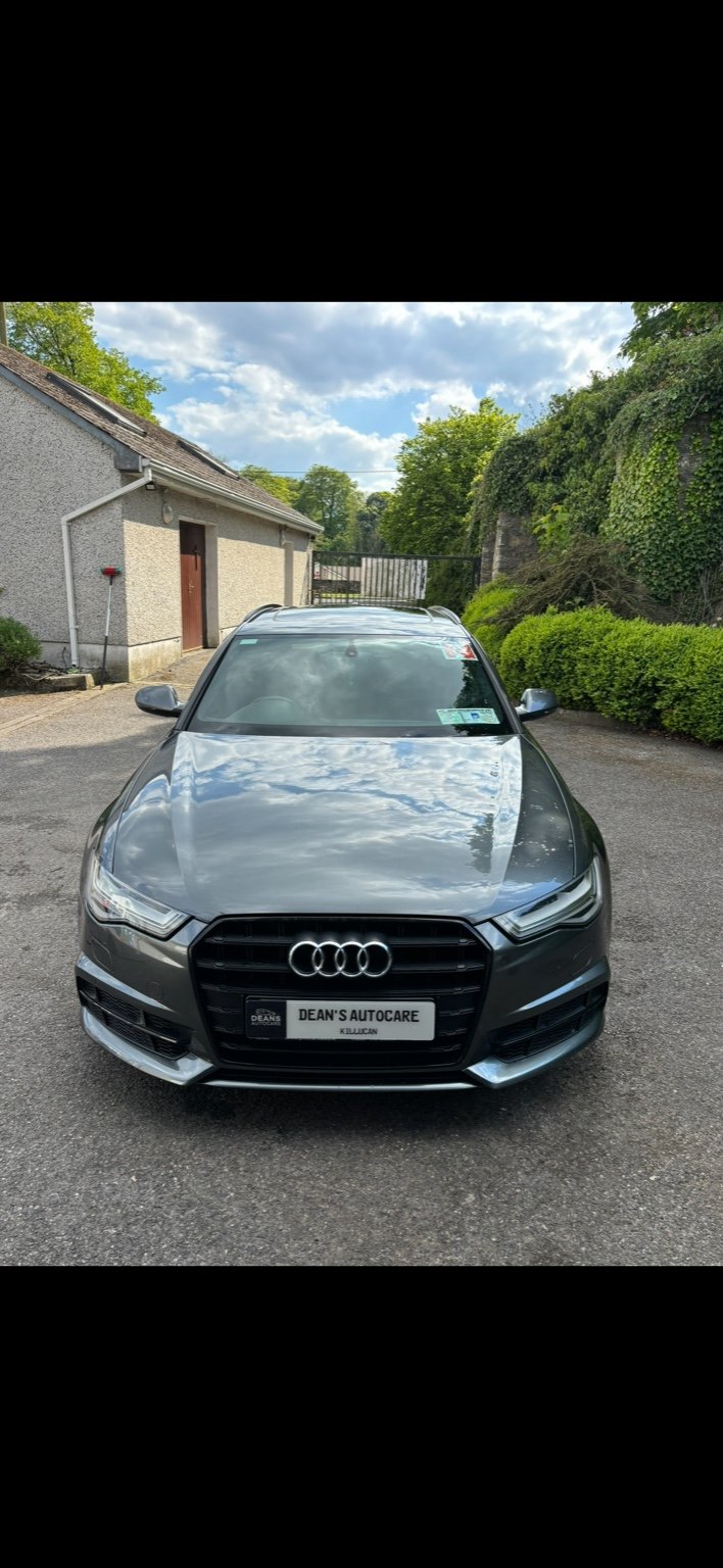 Gloss black Audi after machine polishing